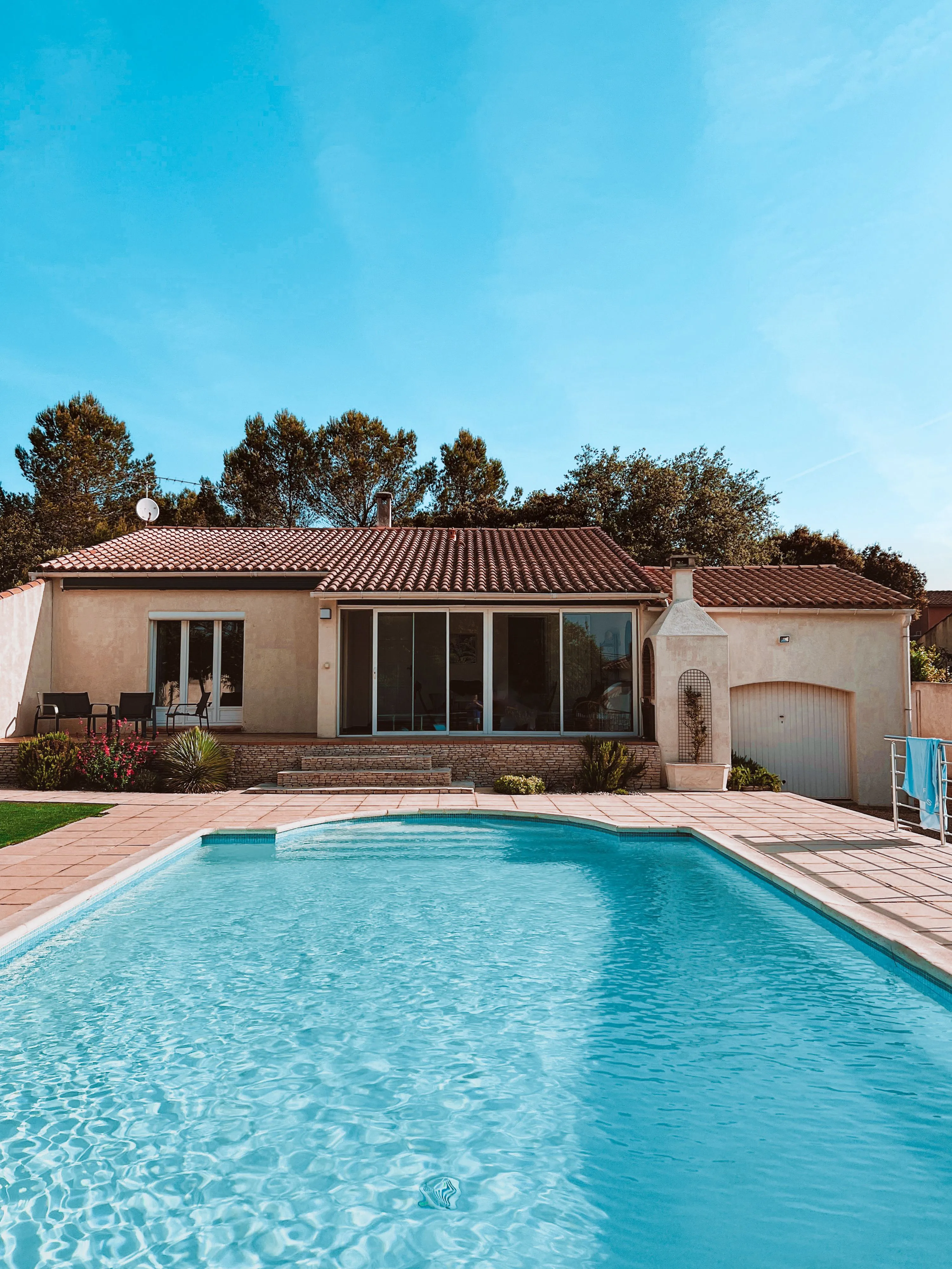 Clean residential swimming pool ready for routine maintenance